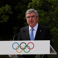 IOC President Thomas Bach speaks during a ceremony in Ancient Olympia, Greece, on October 17. | REUTERS