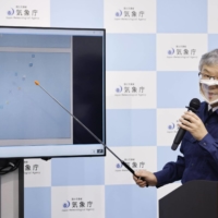 A Meteorological Agency official explains the magnitude 6 earthquake that rattled the Tokara Islands chain in Kagoshima Prefecture on Thursday. | KYODO