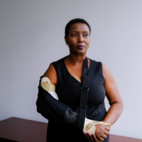 Martine Moise in Miami in July. Gunmen dug through her husband’s files as she lay bleeding, she said. | MARIA ALEJANDRA CARDONA/THE NEW YORK TIMES