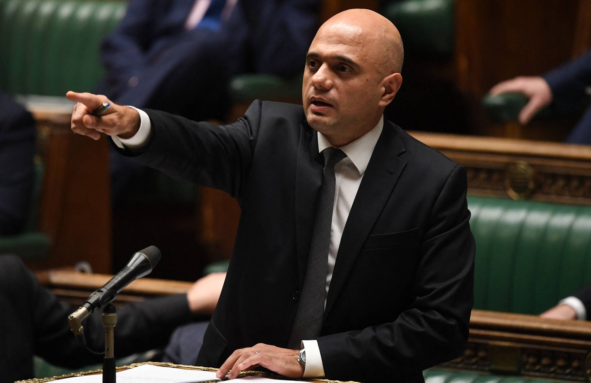 U.K. Health Secretary Sajid Javid attends a debate in the House of Commons in London on Tuesday. | U.K. Parliament / via AFP-Jiji