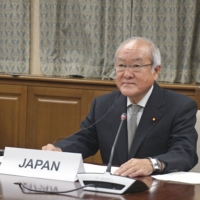 Finance Minister Shunichi Suzuki announced Japan\'s contribution of a record ¥376.7 billion ($3.4 billion) to the International Development Association. | FINANCE MINISTRY / VIA KYODO