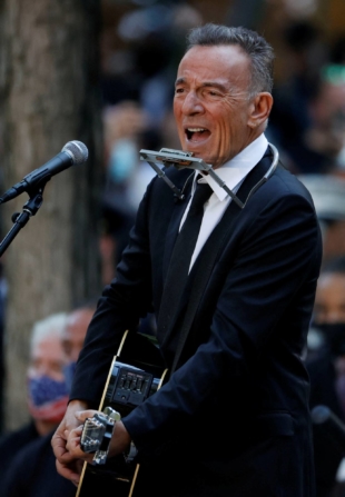 Singer Bruce Springsteen performs during a ceremony marking the 20th anniversary of the 9/11 attacks in New York City. | REUTERS