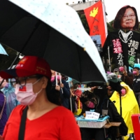 A protest march in Taipei on Sunday. Taiwanese voters will be asked if the government should reimpose a complete ban on imports of pork and pig offal containing ractopamine.  | REUTERS