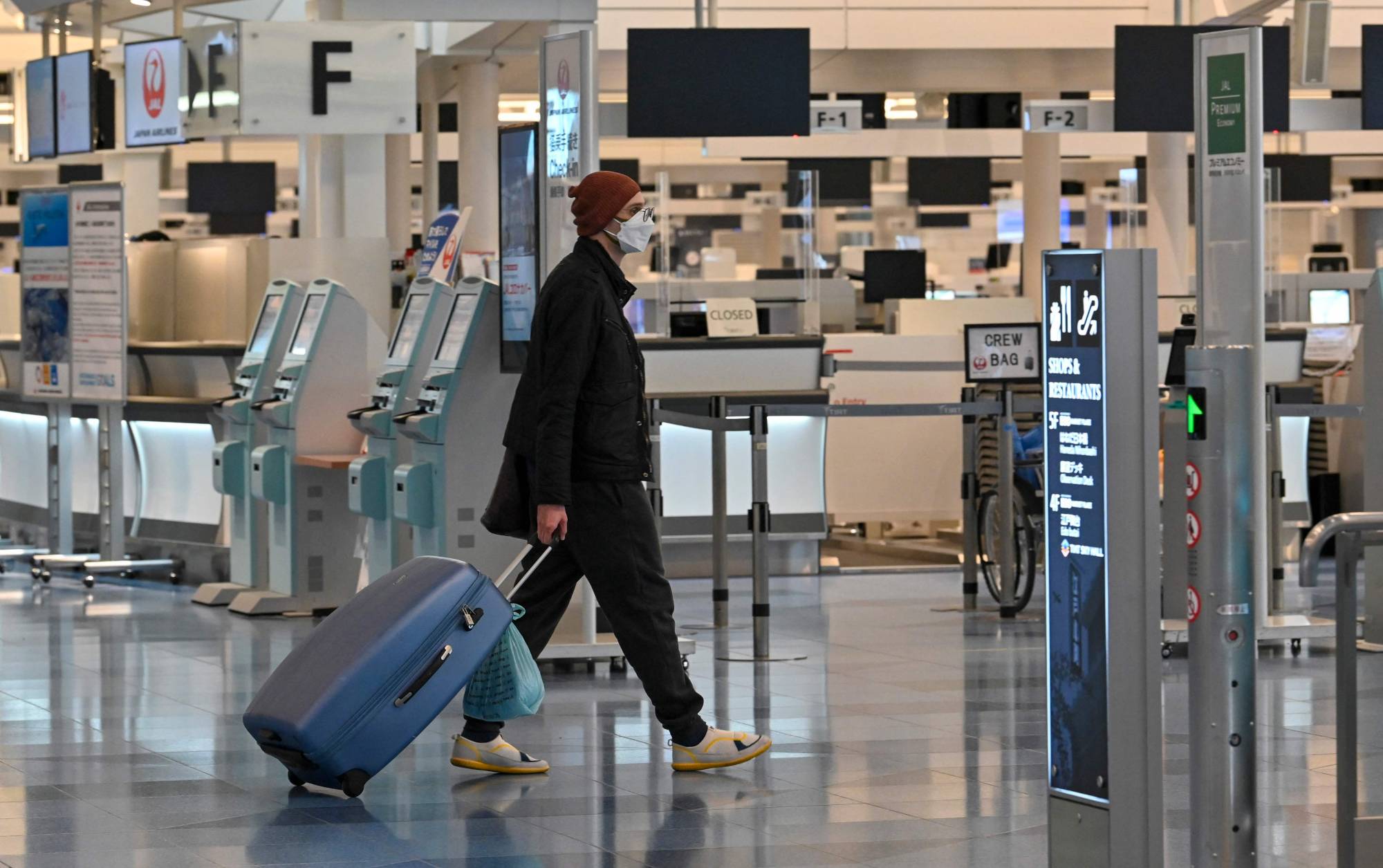 The government has denied that the latest omicron cases are examples of community infection, saying they are closely monitored cases and are traceable even if they slipped through the initial testing at airports. | AFP-JIJI
