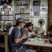 Patrons dine at a restaurant on Ishigaki on Nov. 4, 2021. People on Ishigaki long saw China more as a source of commerce than of danger, but that is changing. | THE NEW YORK TIMES
