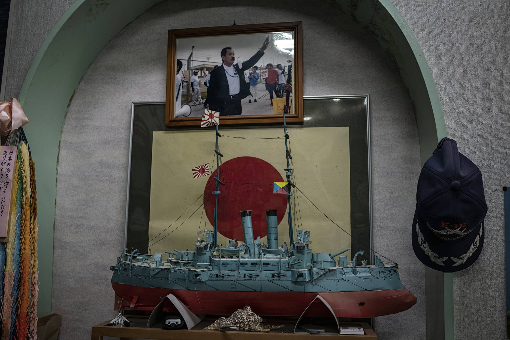 A hawkish pro-Japan display inside a home on Ishigaki. Some Japanese policymakers fear that a conflict over Taiwan could provide China an opportunity to take the Senkaku Islands, or even the southernmost Okinawan islands. | The New York Times