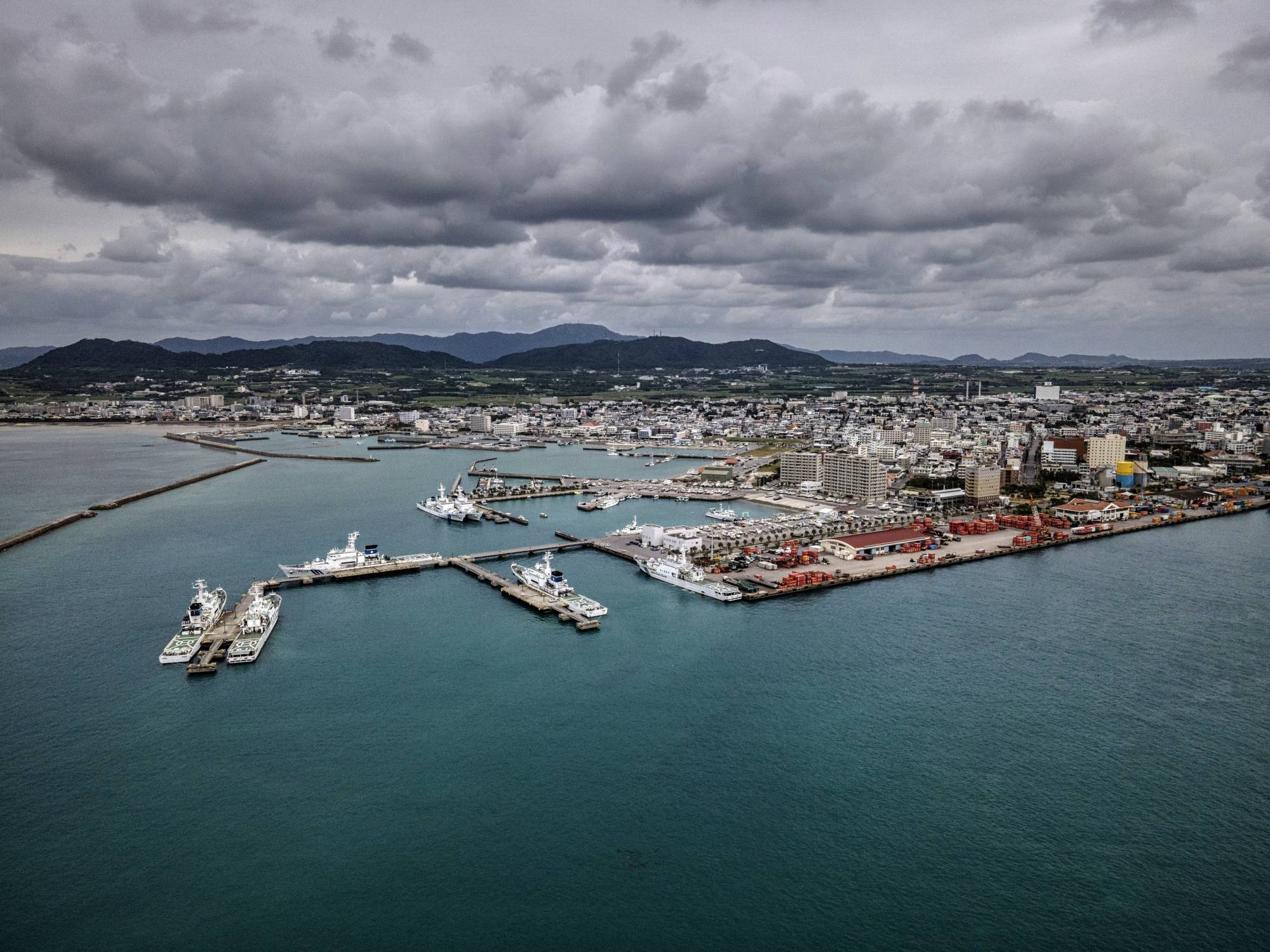 Japan Coast Guard patrol ships docked in the harbor on Ishigaki. The island is home to Japan's largest Coast Guard office, which devotes significant resources to patrolling the Senkaku Islands. | The New York Times