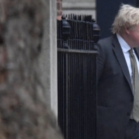 British Prime Minister Boris Johnson leaves No. 10 Downing Street in London on Saturday.  | REUTERS