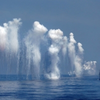 Chaff is set off from a Knox-class frigate during the Han Kuang military exercise held about 10 nautical miles east of the port of Hualien, eastern Taiwan, in September 2014. | REUTERS