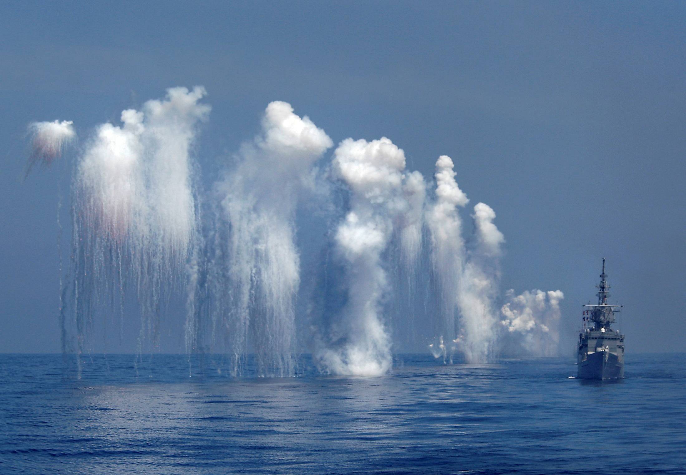Chaff is set off from a Knox-class frigate during the Han Kuang military exercise held about 10 nautical miles east of the port of Hualien, eastern Taiwan, in September 2014. | REUTERS