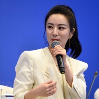 Livesreamer Huang Wei, also known as Viya, speaks at an event in Boao, in south China\'s Hainan province, in April. | CNS / VIA AFP-JIJI