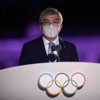 International Olympic Committee President Thomas Bach speaks at the Tokyo Games opening ceremony on July 23. | REUTERS