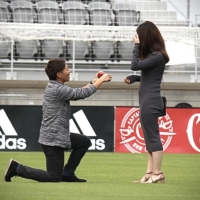 Kumi Yokoyama proposes to their partner Nami on Oct. 25 at Audi Field in Washington. | WASHINGTON SPIRIT