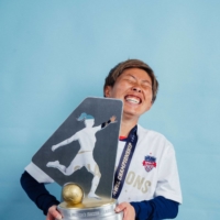 Kumi Yokoyama poses with the NWSL championship trophy. | WASHINGTON SPIRIT
