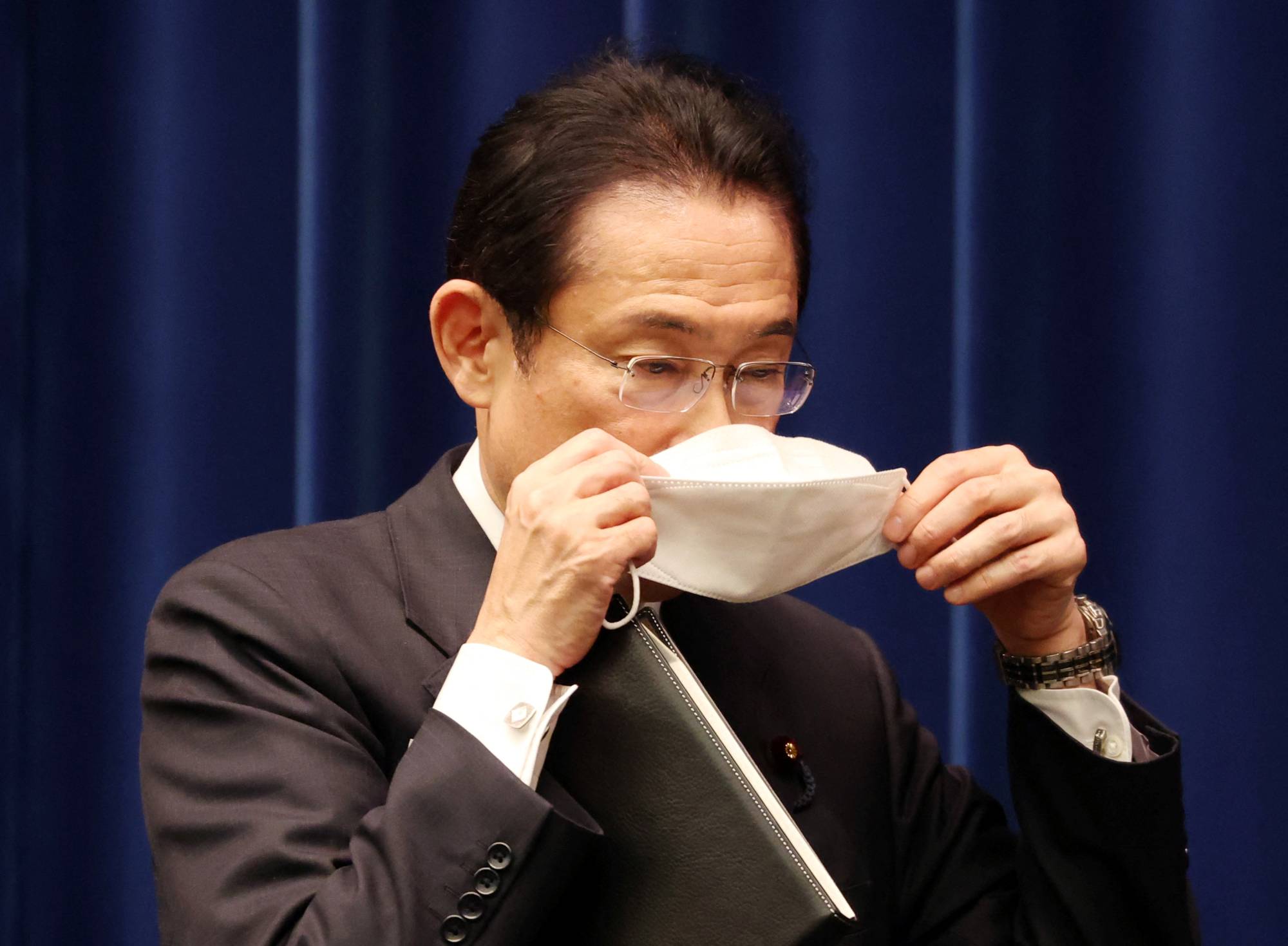 Prime Minister Fumio Kishida leaves a news conference in Tokyo on Dec. 21. | Pool / via REUTERS