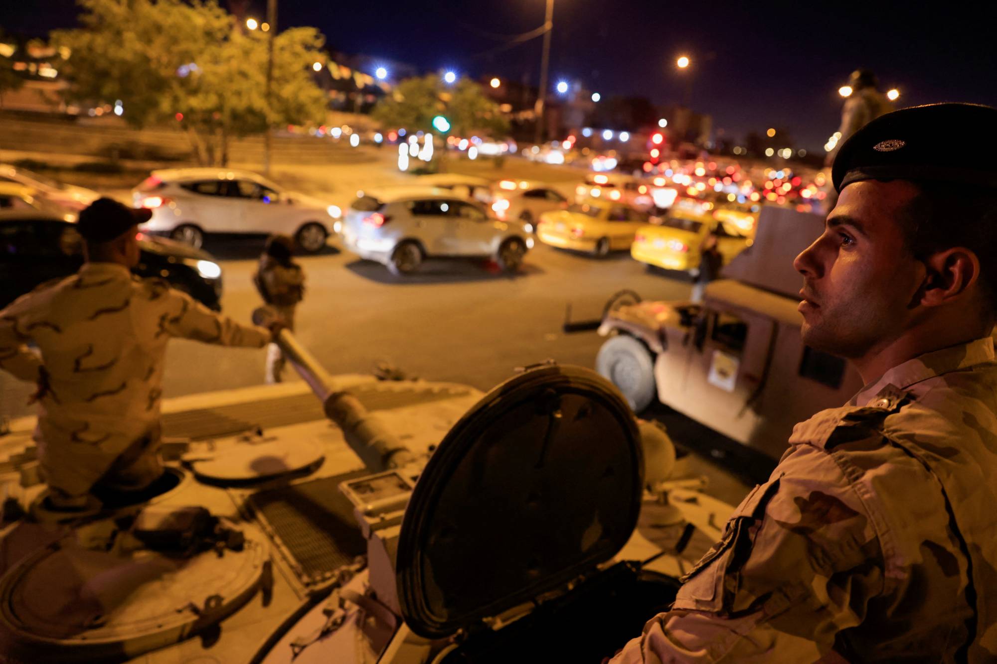 Iraqi soldiers take part in an intensive security deployment following a drone attack on Prime Minister Mustafa al-Kadhimi's residence in Baghdad on Nov. 7.  | REUTERS