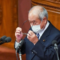 Finance Minister Shunichi Suzuki prepares to deliver a speech at parliament in Tokyo on Dec. 6. | AFP-JIJI