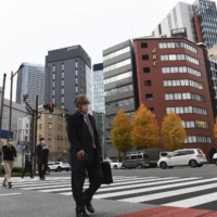 Tokyo confirmed its first case of community transmission involving the omicron variant on Friday. | NORIKO HAYASHI / THE NEW YORK TIMES 