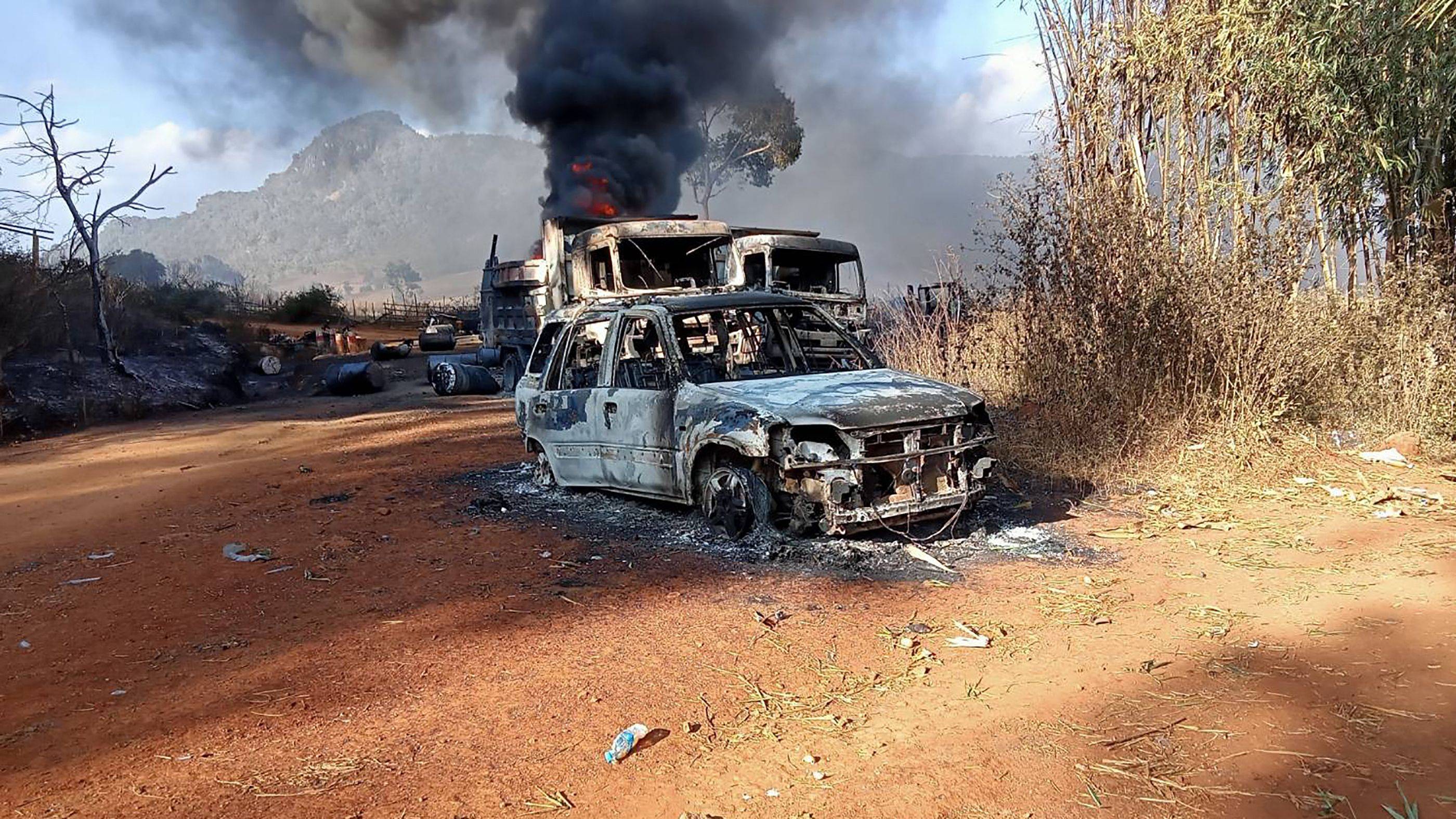 Burned vehicles in Hpruso township in Myanmar's Kayah state | KARENNI NATIONALITIES DEFENSE FORCE / VIA AFP-JIJI