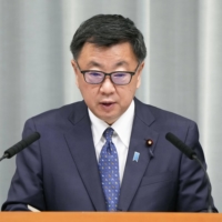 Chief Cabinet Secretary Hirokazu Matsuno hold a news briefing at the Prime Minister\'s Office on Monday. | KYODO