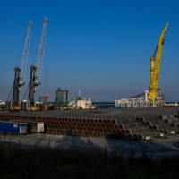 Pipes for the Nord Stream 2 Baltic Sea gas pipeline at the Port of Mukran in Sassnitz, Germany, in August 2020. The Nord Stream 2 Russia-to-Germany pipeline could offer plentiful natural gas but tensions with Vladimir Putin are keeping it out of reach. | LENA MUCHA / THE NEW YORK TIMES