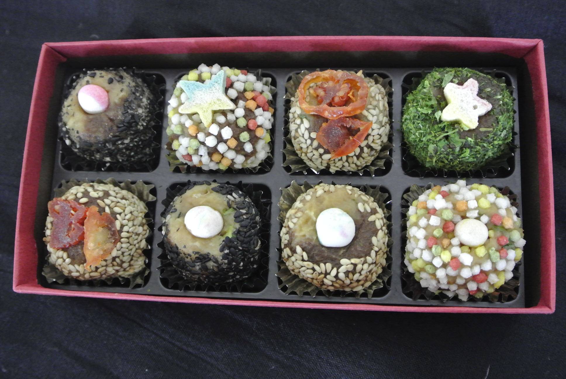 A box of 'miso drops' decorated with such ingredients as sesame, rice crackers and dried tomato. | KYODO