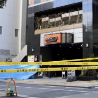 Police arrested a woman Wednesday for allegedly pushing her 9-year-old son to death from a Tokyo hotel. | KYODO 