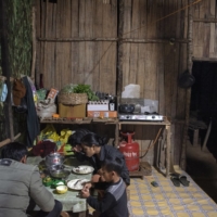 Biak Tling and Tial Hoi Chin dine with their eldest son, Van Nawl Tling, 5, at their new home in Farkawn, India, on Dec. 10. | SAUMYA KHANDELWAL / THE NEW YORK TIMES