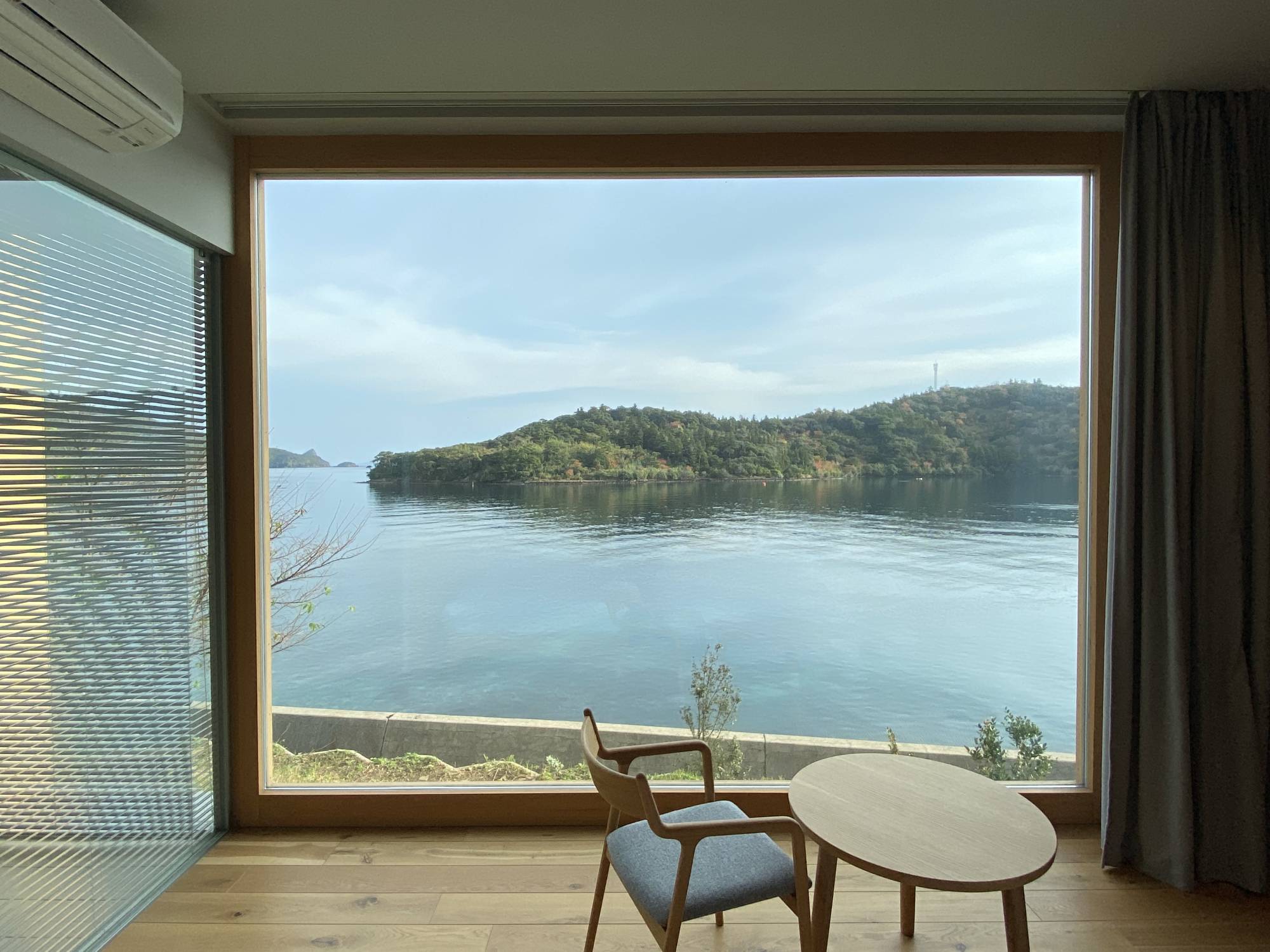 The Nest rooms in the newly built annex wing of Ento Hotel have been designed by Mount Fuji Architects Studio and offer spectacular views over the harbor. | KIT NAGAMURA