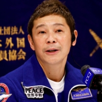 Japanese billionaire Yusaku Maezawa attends a news conference at the Foreign Correspondents\' Club of Japan in Tokyo Friday. | REUTERS