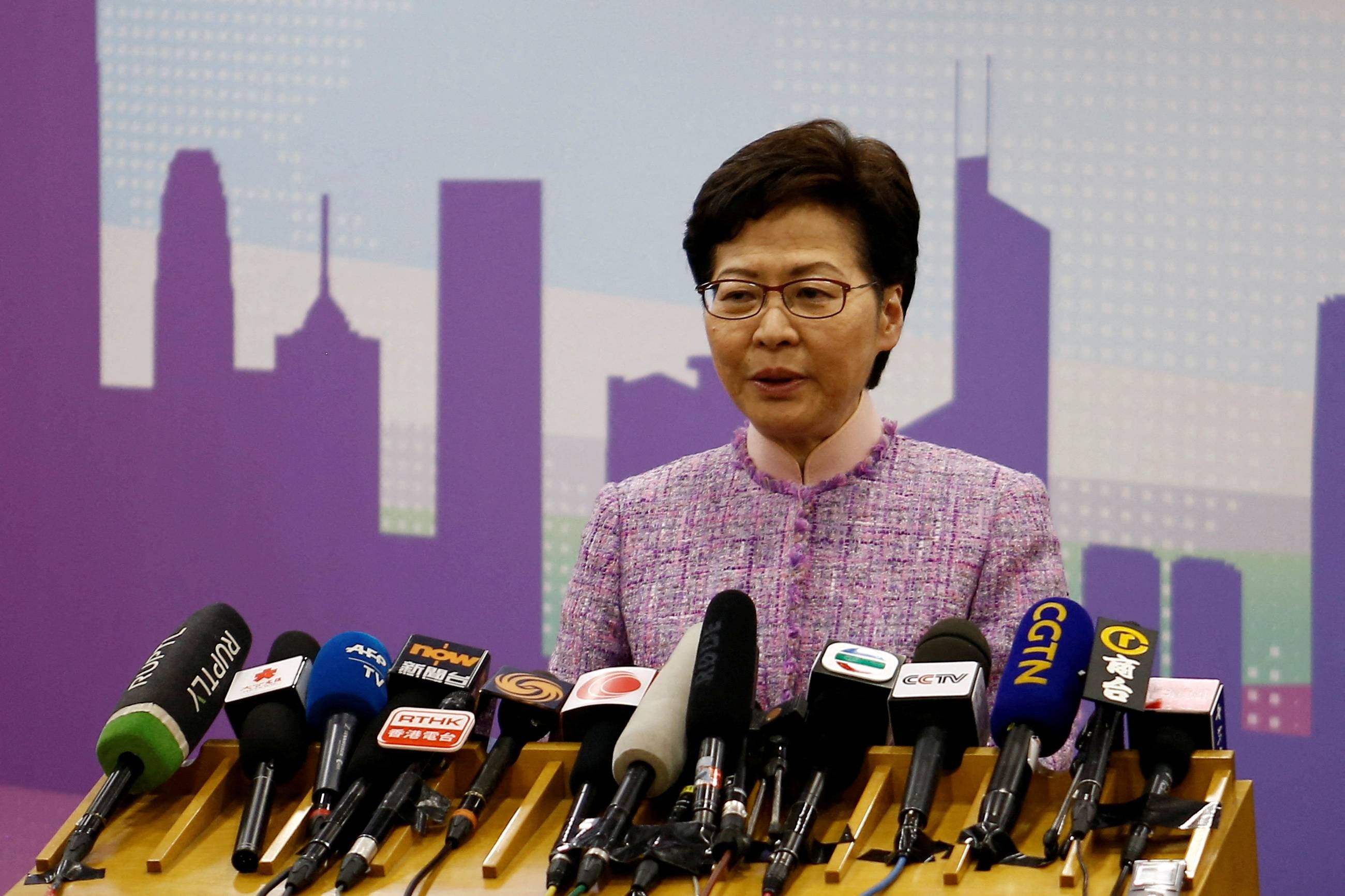 Hong Kong Chief Executive Carrie Lam speaks at a news conference in Beijing on Dec. 22. | Reuters