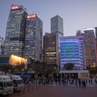 Hong Kong residents queue for a COVID-19 test on Friday.  | BLOOMBERG 