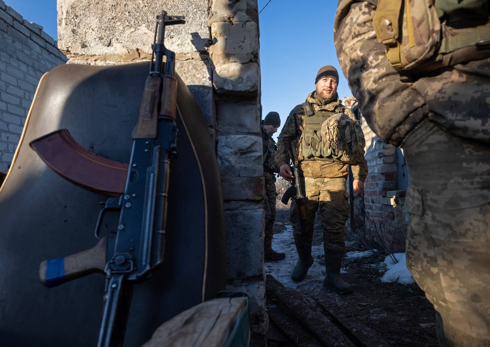 Ukrainian armed forces service members man combat positions near the line of separation from Russian-backed rebels near Horlivka, in Ukraine's Donetsk region, on Saturday. | REUTERS