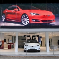 Tesla Inc.\'s price cut helped double foreign electric vehicle sales in Japan in 2021. | REUTERS