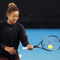 Naomi Osaka practices for the Australian Open in Melbourne on Friday. | AFP-JIJI