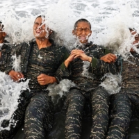 ARP trainees battle the waves while completing training exercises on Dec. 18.  | REUTERS
