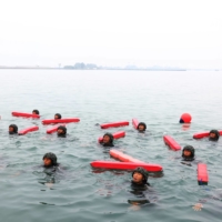 ARP trainees try to stay above water for hours at a time as part of their training to become members of the Taiwan navy\'s elite Amphibious Reconnaissance and Patrol unit.  | REUTERS
