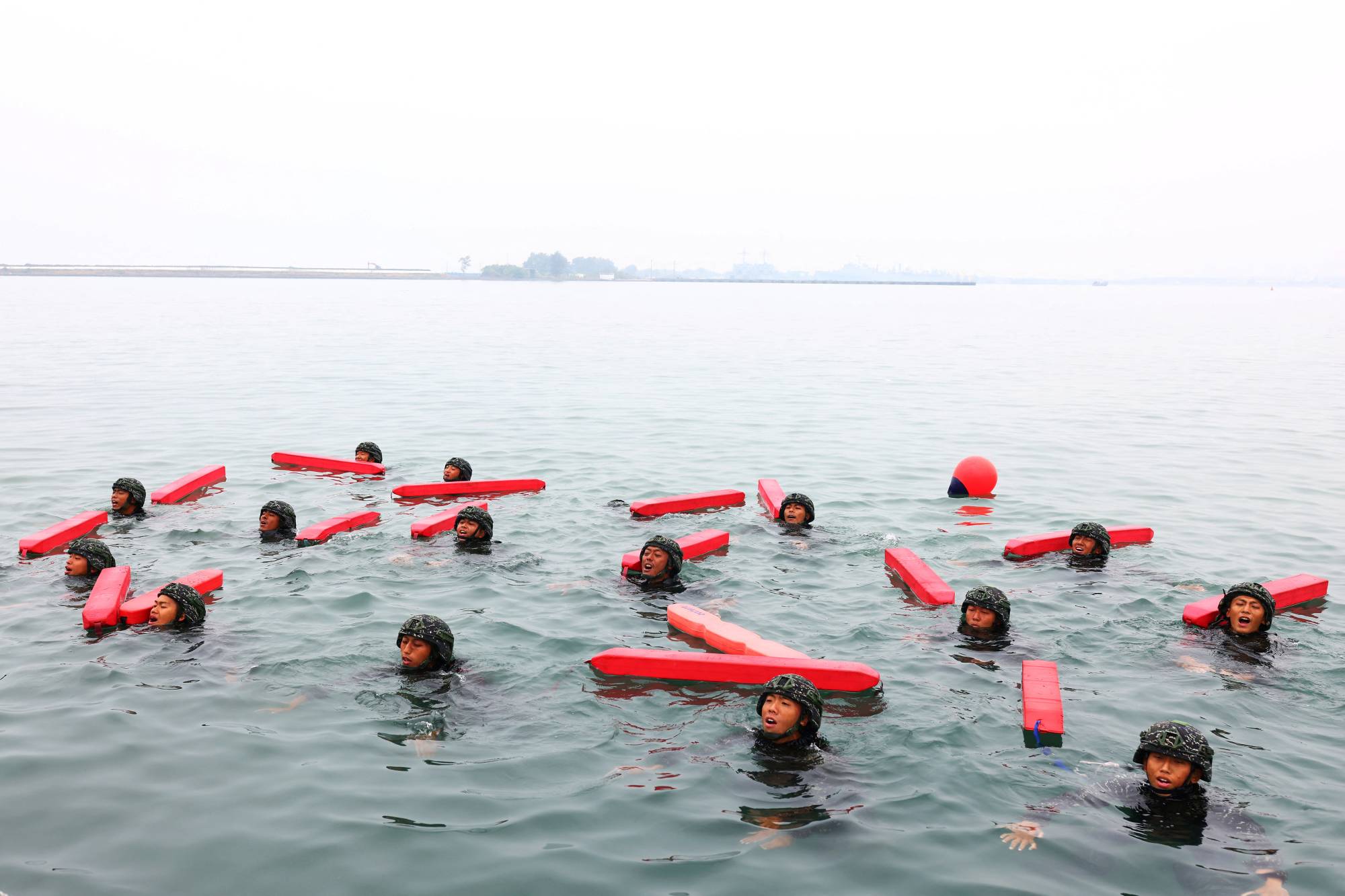 ARP trainees try to stay above water for hours at a time as part of their training to become members of the Taiwan navy's elite Amphibious Reconnaissance and Patrol unit. | Reuters