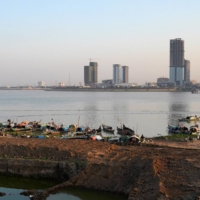 Fishing boats along the banks of the Mekong River in Phnom Penh in February 2021.  | REUTERS