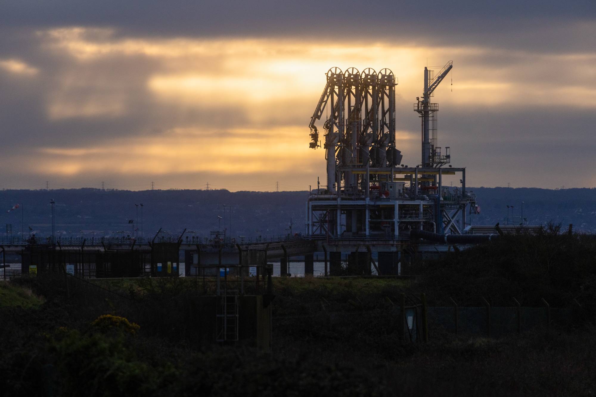 Pipelines to transfer LNG from ship to shore at the National Grid's import terminal on the Isle of Grain near Rochester, U.K., on Jan. 4. Natural gas prices in Europe started the year extending the sharp drop seen in the last month as rising flows eased concerns that supplies would be lacking during the winter. | Bloomberg