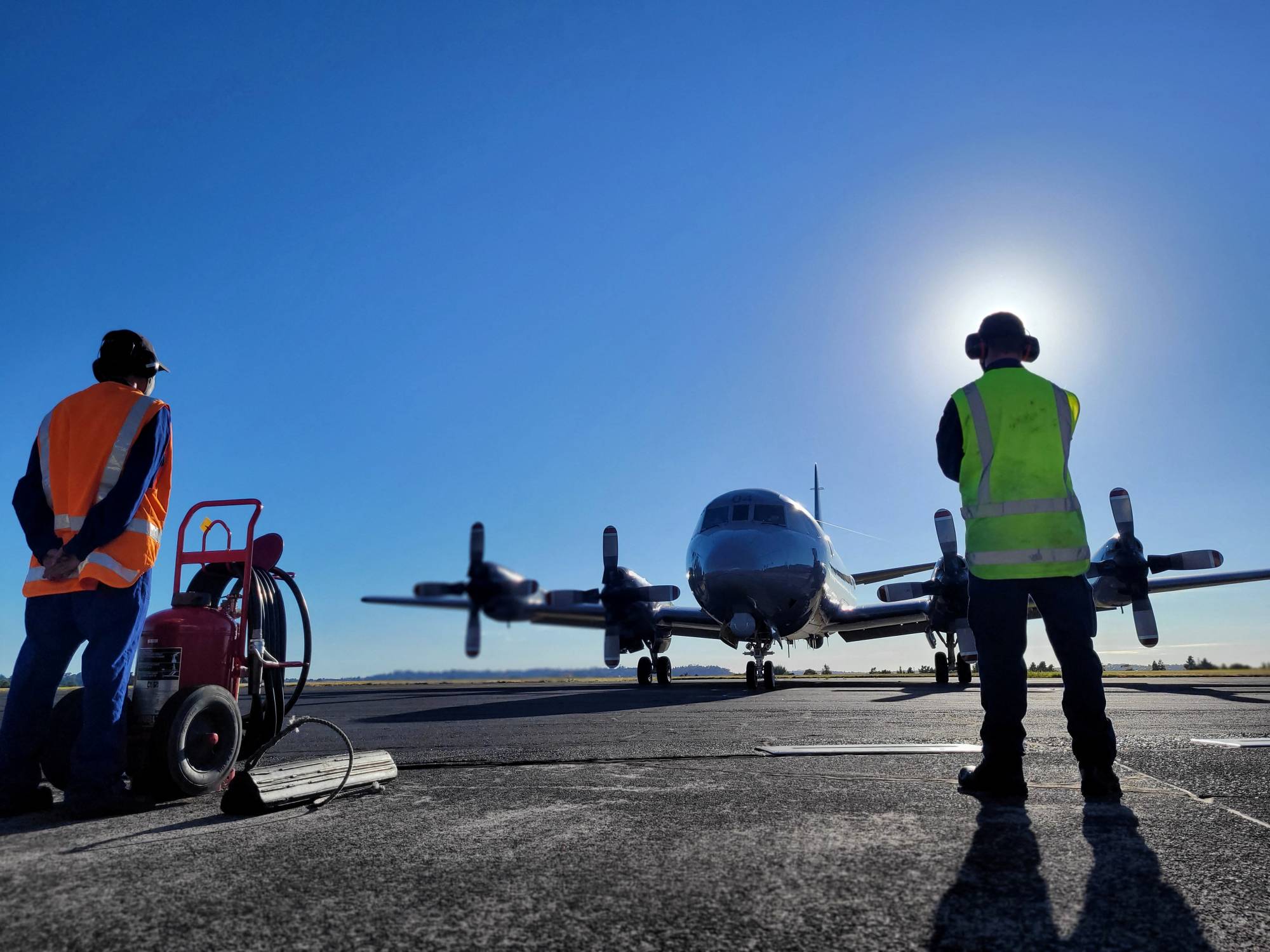 A Royal New Zealand Air Force Orion aircraft prepares to leave Base Auckland for Tonga to assist in an initial impact assessment of the area and low-lying islands after the Pacific island nation was hit by a tsunami triggered by a massive undersea volcanic eruption. | New Zealand Defence Force/Handout via REUTERS 