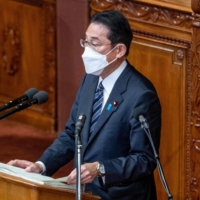 Prime Minister Fumio Kishida delivers a policy speech during a Lower House plenary session in Tokyo on Monday. | AFP-JIJI
