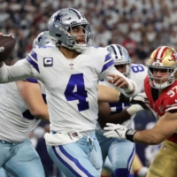 Dallas quarterback Dak Prescott attempts a pass against the 49ers during their playoff game in Arlington, Texas, on Sunday. | USA TODAY / VIA REUTERS
