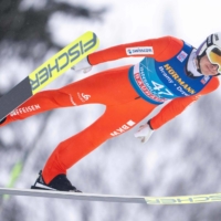 Switzerland\'s Simon Ammann soars through the air during an event in Bischofshofen, Austria, on Jan. 5. | AFP-JIJI