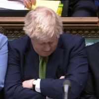 British Prime Minister Boris Johnson reacts to questioning by the main opposition leader, Labour\'s Keir Starmer, in the House of Commons in London on Wednesday. | PRU / VIA AFP-JIJI