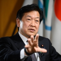 Environment Minister Tsuyoshi Yamaguchi speaks during an interview in Tokyo on Wednesday. | BLOOMBERG