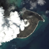 A satellite image shows the Hunga Tonga-Hunga Ha\'apai volcano before its main eruption, on Dec. 24. | SATELLITE IMAGE / 2022 MAXAR TECHNOLOGIES / VIA REUTERS