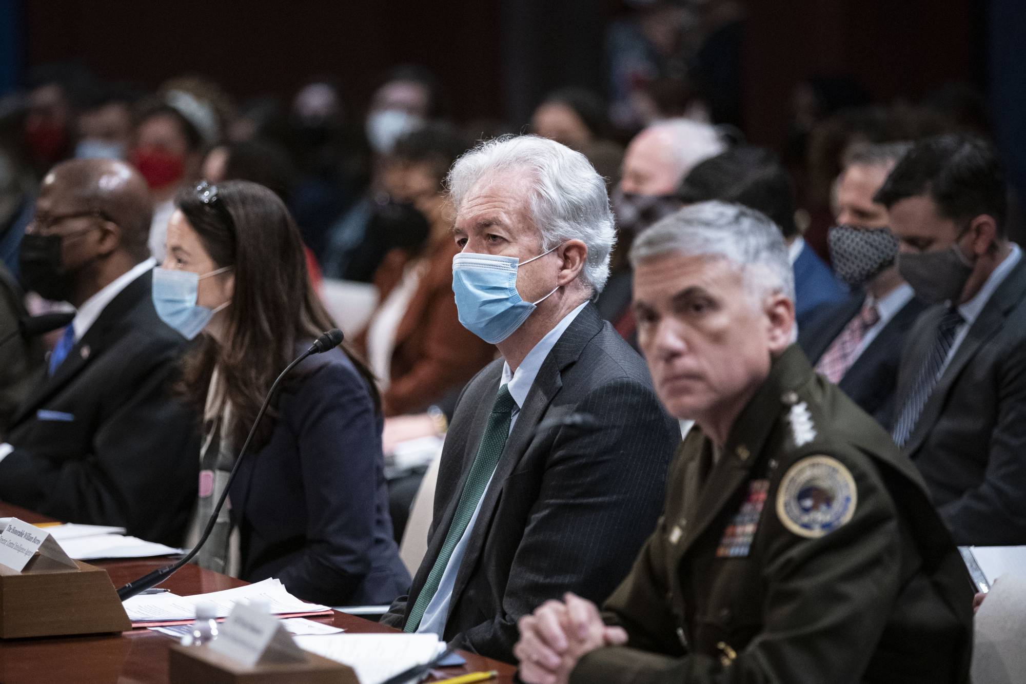 William Burns (center), the CIA director, testifies on Capitol Hill in Washington in October 2021. The CIA and government scientists have for months been working to find the cause of so-called Havana syndrome, involving chronic ailments reported by intelligence officers and diplomats, but the incidents remain unexplained. | Al Drago / The New York Times