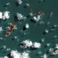 A satellite image shows the Hunga Tonga-Hunga Ha\'apai volcano after its main eruption, in Hunga-Tonga-Hunga-Ha\'apai, Tonga, Tuesday. | 2022 MAXAR TECHNOLOGIES / VIA REUTERS