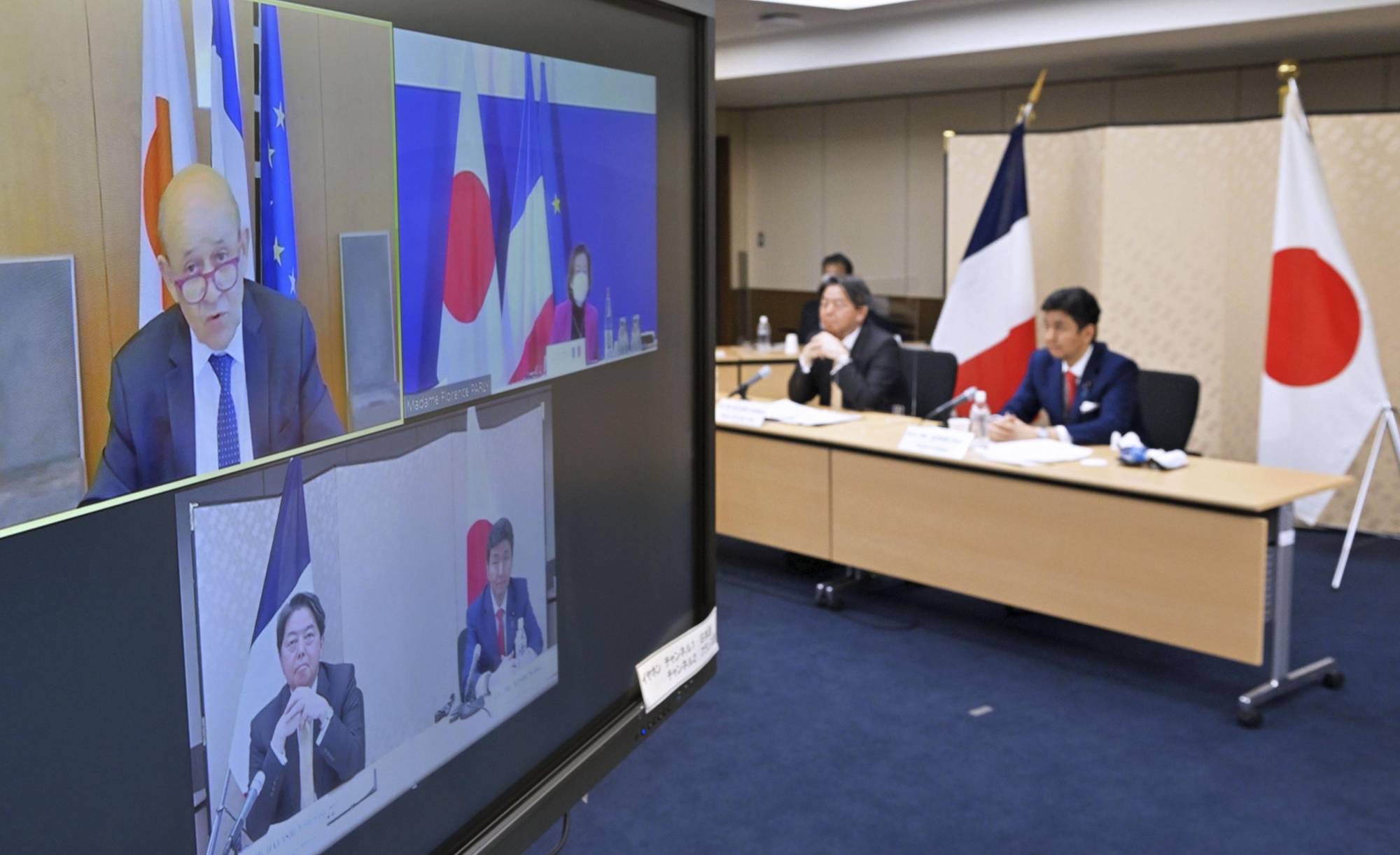 Foreign and defense ministers of Japan and France hold a teleconference on Thursday. | POOL / VIA KYODO